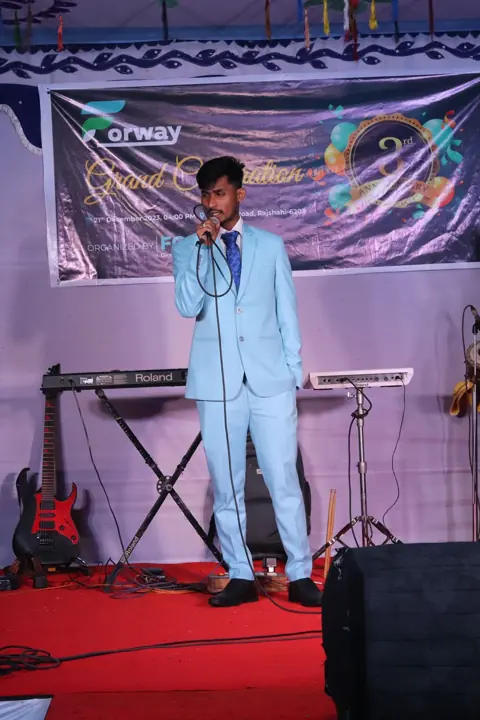 Forway team member speaking at a company event